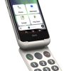 Open flip phone with large numeric keypad and touchscreen; home screen shows app shortcuts such as Phone, Messages, Google, Play Store.
