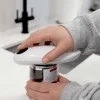 Tornado tin opener in use