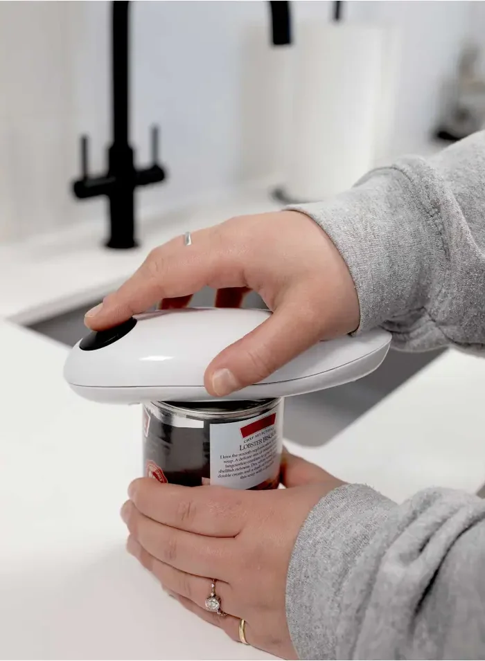 Tornado tin opener in use