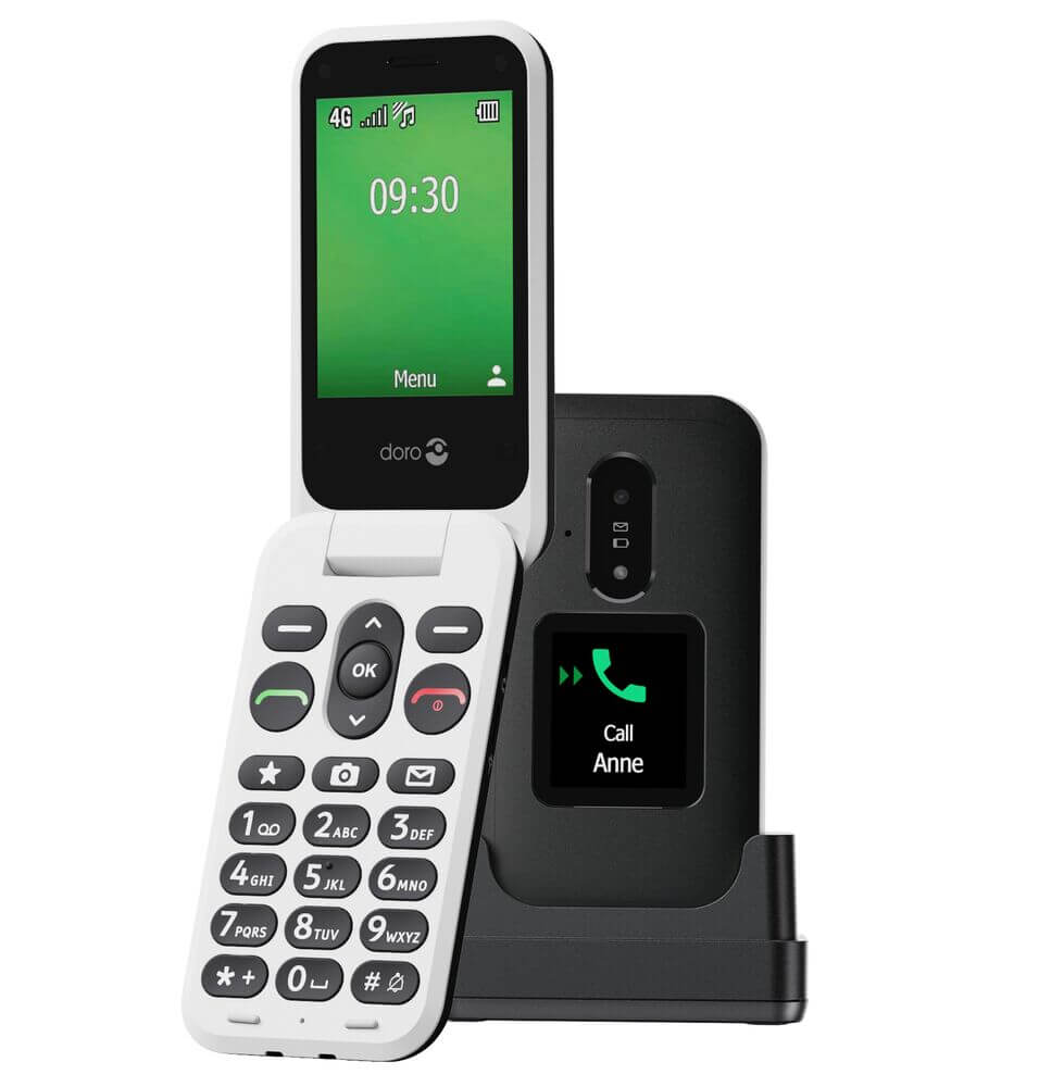 White dual-piece cordless flip phone with a large keypad and charging dock; screen shows 09:30 and Menu (Doro brand).